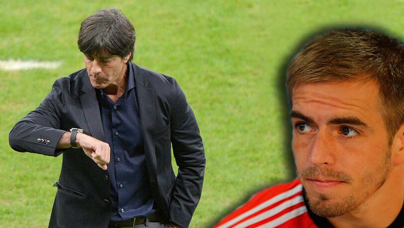 Jogi Löw (l.) muss die richtigen Antworten auf die hitzigen Debatten um die Position von Kapitän Philipp Lahm finden. Jogi Löw (l.) muss die richtigen Antworten auf die hitzigen Debatten um die Position von Kapitän Philipp Lahm finden.