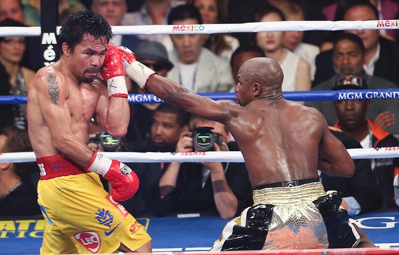 Floyd Mayweather hat den Angriff von Manny Pacquiao im Rekord-Boxkampf erfolgreich abgewehrt und bleibt auch in seinem 48. Profi-Duell ungeschlagen. Der Fight in Bildern.