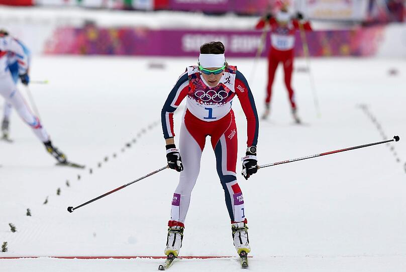 Langläuferin Maiken Caspersen Falla gewinnt Gold im Freistil-Sprint.