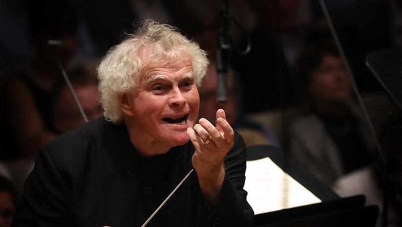 Sir Simon Rattle. Sir Simon Rattle.