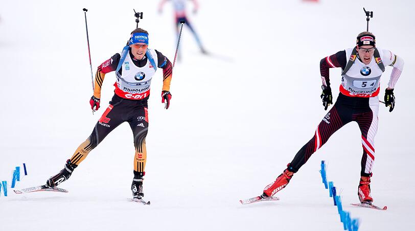 Simon Schempp(links) verliert das Sprintduell gegen den Österreicher Dominik Landertinger hauchdünn um 0,1 Sekunden