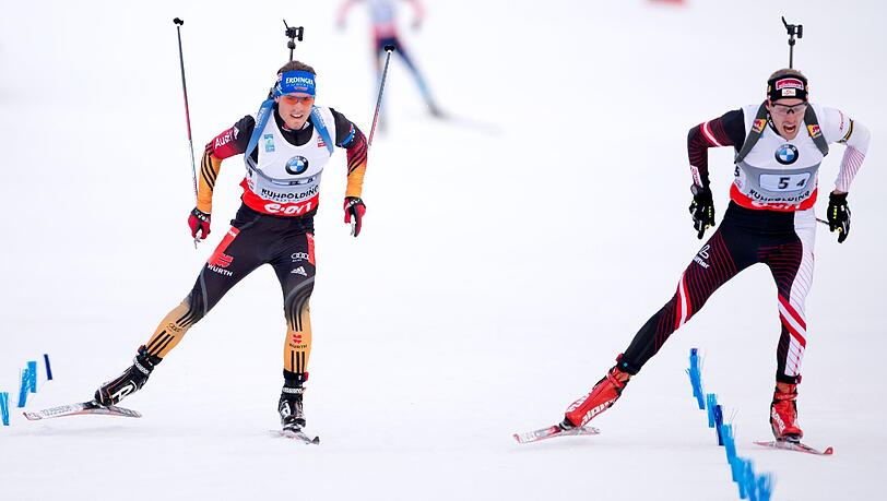 Simon Schempp(links) verliert das Sprintduell gegen den Österreicher Dominik Landertinger hauchdünn um 0,1 Sekunden Simon Schempp(links) verliert das Sprintduell gegen den Österreicher Dominik Landertinger hauchdünn um 0,1 Sekunden