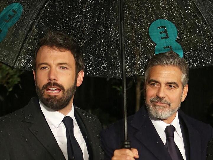 Dier beiden Batmans: Ben Affleck (l) und George Clooney.