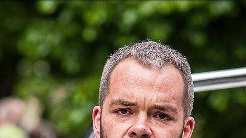Andreas Krahl (Grüne) bei einer Protestaktion in München.
