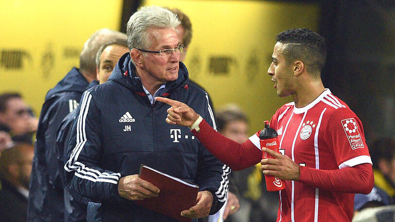 Bayern-Trainer Jupp Heynckes (links) und Mittelfeldspieler Thigao.