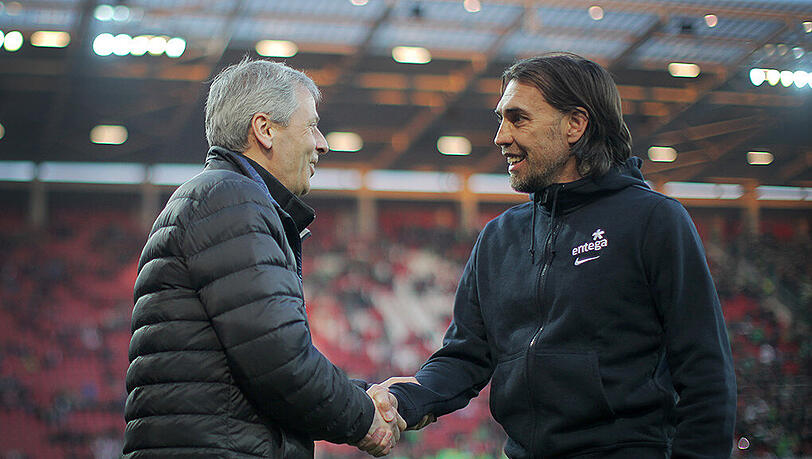 Schweizer unter sich: Gladbach-Trainer Lucien Favre (l) und Mainz-Coach Martin Schmidt. Schweizer unter sich: Gladbach-Trainer Lucien Favre (l) und Mainz-Coach Martin Schmidt.