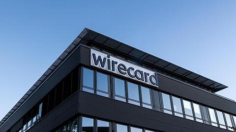 Der Schriftzug von Wirecard ist an der Firmenzentrale in Aschbeim zu sehen. Foto: Peter Kneffel/dpa/