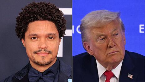 Donald Trump (r.) droht Trevor Noah.