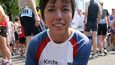Margot Käßmann im Lauf-Shirt