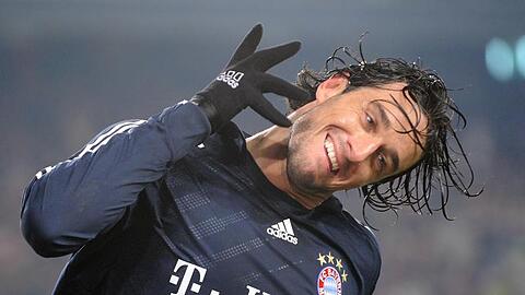 Auch angezogen ein Frauenschwarm:  Bayern-Star Luca Toni
