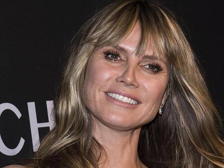 Heidi Klum zeigt sich und ihre Familie mit Schutzmasken.