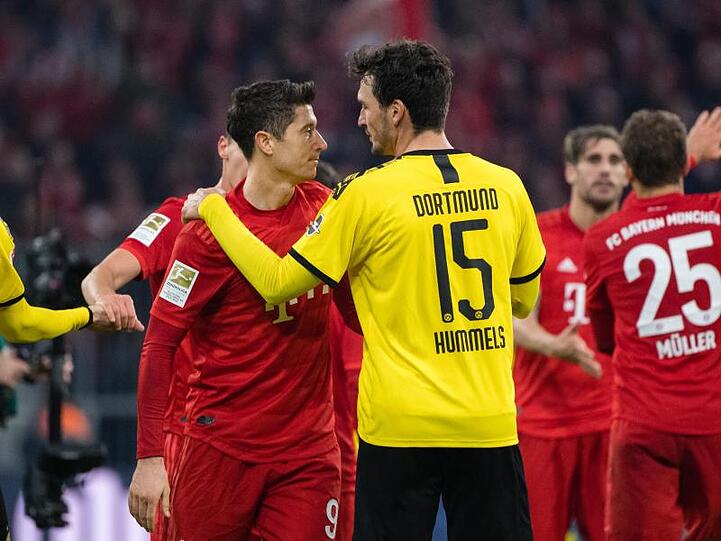 Treffen am Dienstag im Topspiel aufeinander: Bayern-Torjäger Robert Lewandowski (l) und BVB-Verteidiger Mats Hummels.