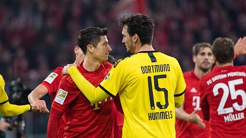 Treffen am Dienstag im Topspiel aufeinander: Bayern-Torjäger Robert Lewandowski (l) und BVB-Verteidiger Mats Hummels.