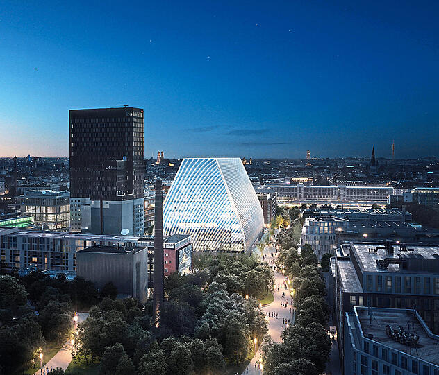 Das geplante Konzerthaus im Werksviertel hinter dem Ostbahnhof, dessen Lichter im Hintergrund rechts leuchten. Der Entwurf für den Bau stammt vom Bregenzer Atelier der Architekten Andreas Cukrowicz und Anton Nachbaur-Sturm.
