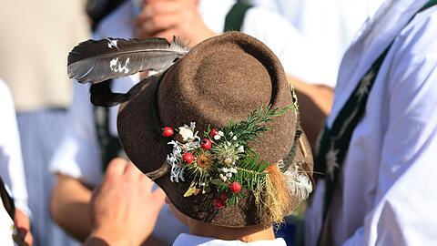 Ein junger Hirte nimmt am Viehscheid in Memhölz teil.