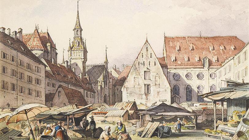 Markttreiben am Viktualienmarkt mit Blick auf Heilig-Geist-Spital und Kirche. Im Hintergrund der Turm des Alten Rathauses, die Apsis von Sankt Peter und das Kirchenschiff der Heilig-Geist-Kirche.