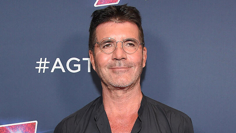 Simon Cowell hat ein Herz für Hunde Simon Cowell hat ein Herz für Hunde