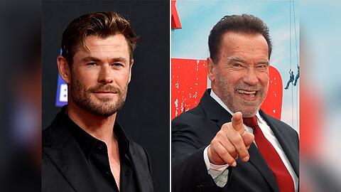 Chris Hemsworth (l.) traf Vorbild Arnold Schwarzenegger.