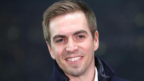 Der frühere Fußball-Nationalspieler Philipp Lahm lächelt in die Kamera. Foto: Christian Charisius/Archivbild