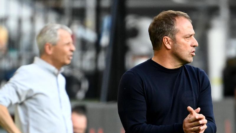 Treffen im Bundesliga-Gipfel mit ihren Teams aufeinander: Bayern-Coach Hansi Flick (r) und Dortmunds Lucien Favre.