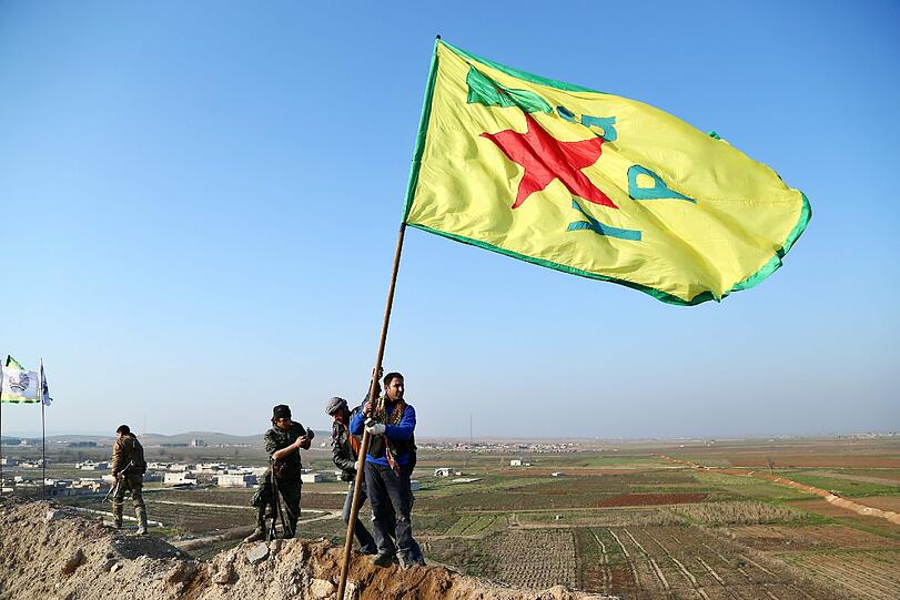 Kurdische Kämpfer feiern die Befreiung von Kobane. Doch wie geht es jetzt weiter?