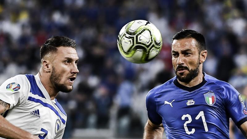Ermin Bicakcic (l) von Bosnien-Herzegowina und der Italiener Fabio Quagliarella in Aktion. Ermin Bicakcic (l) von Bosnien-Herzegowina und der Italiener Fabio Quagliarella in Aktion.