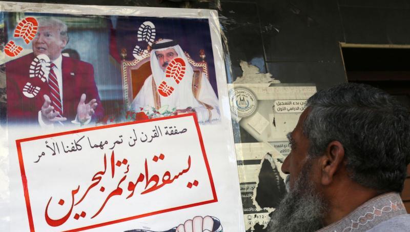 Ein Mann steht vor einem geschlossenem Geschäft in Chan Yunis. Palästinenser im Gazastreifen streiken aus Protest gegen die Konferenz in Bahrain. Ein Mann steht vor einem geschlossenem Geschäft in Chan Yunis. Palästinenser im Gazastreifen streiken aus Protest gegen die Konferenz in Bahrain.