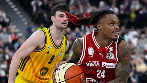 Cobe Williams (r) feiert mit Bamberg den Pokalsieg.