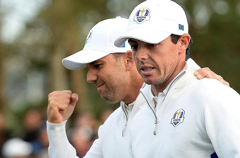 Rory McIlroy (r) und Sergio Garcia sind sich siegessicher.