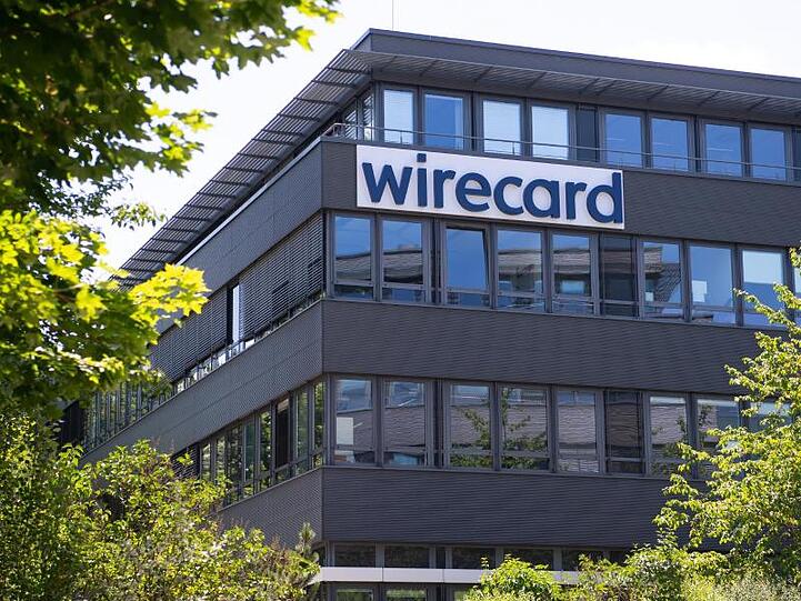 Der Schriftzug von Wirecard an der Firmenzentrale des Zahlungsdienstleisters. Foto: Sven Hoppe/dpa/Archivbild