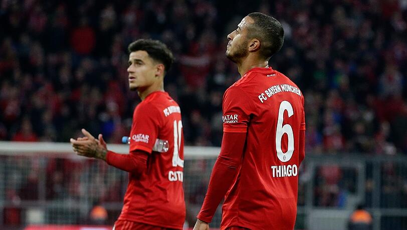 "Sie tun uns gut", sagt Flick über Thiago (r.) und Coutinho. "Sie tun uns gut", sagt Flick über Thiago (r.) und Coutinho.