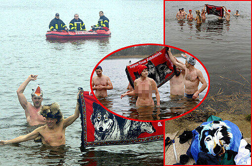 Hinten steht die Wasserwacht schon bereit: Beim Weihnachtsbaden sind heuer wieder die Mitglieder des Sportvereins Lupus-Team ins eisige Wasser gehüpft...
