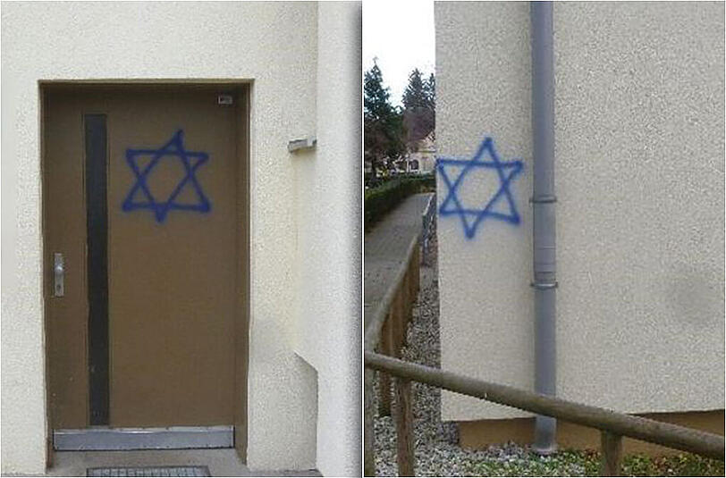 Diese Fotos veröffentlichte die Polizei am Freitag. Unbekannte beschmierten mehrere Häuser mit Davidsternen.