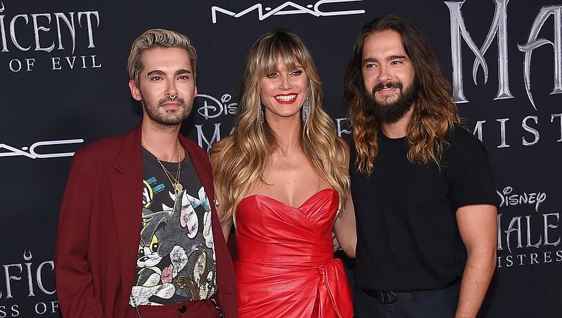 Heidi Klum mit den Kaulitz-Zwillingen auf dem roten Teppich.