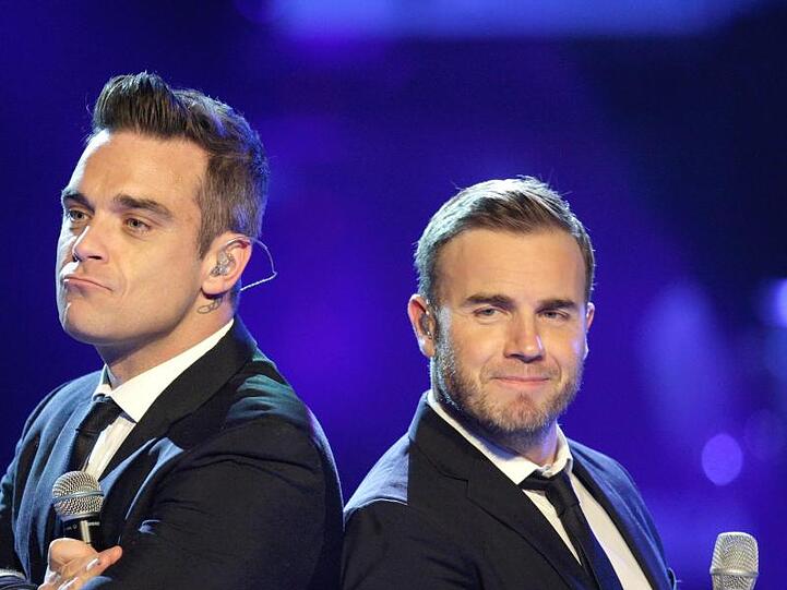 Robbie Williams (l) und Gary Barlow bei der Casting-Show "Popstars - Girls Forever" 2010 in Köln.