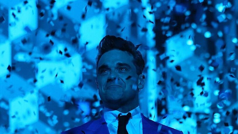 Genießt das Tourleben als Glitzerwelt mit bösen Folgen: Robbie Williams Genießt das Tourleben als Glitzerwelt mit bösen Folgen: Robbie Williams