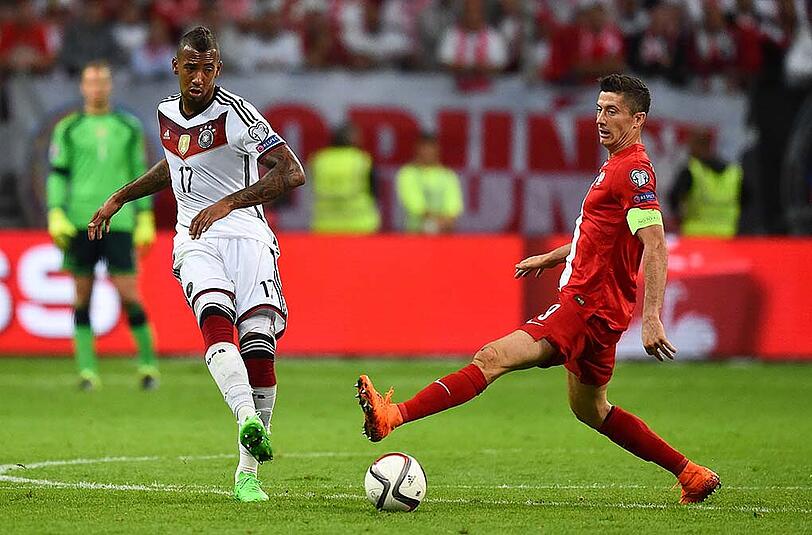 Kennen sich bestens: Die Bayern-Profis Lewandowski und Boateng.