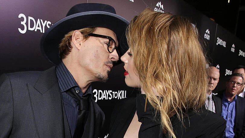 Johnny Depp zeigt sich mit seiner Liebe Amber Heard auf dem roten Teppich Johnny Depp zeigt sich mit seiner Liebe Amber Heard auf dem roten Teppich