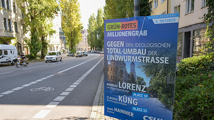 Die Lindwurmstraße ist inzwischen sogar Thema im Landtagswahlkampf. Der CSU-Kandidat plakatiert gegen die Pläne.