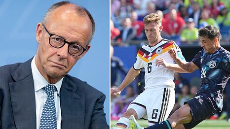Friedrich Merz (li.) hat sich erneut zum WM-Aus der deutschen Nationalmannschaft ge&auml;u&szlig;ert.