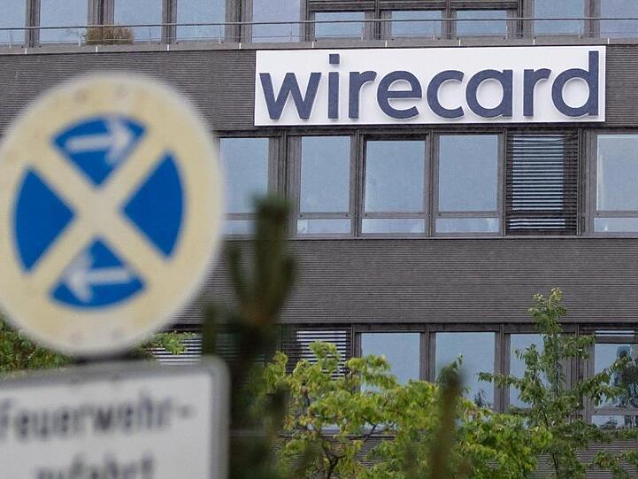 Der Schriftzug von Wirecard ist an der Firmenzentrale des Zahlungsdienstleisters zu sehen. Foto: Sven Hoppe/dpa/Archivbild