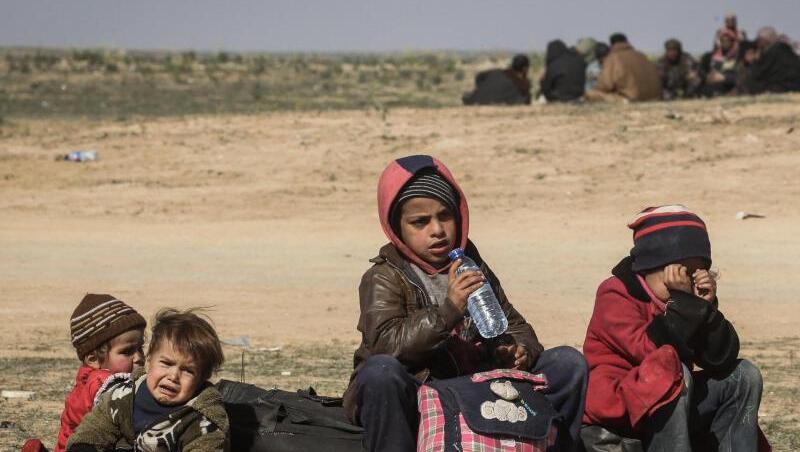 Vor den Kämpfen gegen die Terrormiliz Islamischer Staat (IS) geflüchtete Kinder bei Al-Baghus in Syrien. Vor den Kämpfen gegen die Terrormiliz Islamischer Staat (IS) geflüchtete Kinder bei Al-Baghus in Syrien.