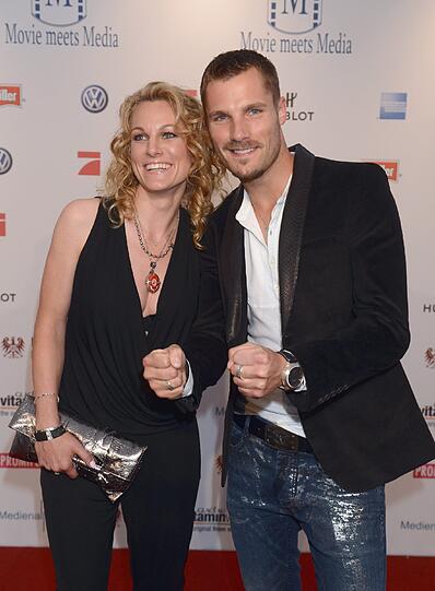 DTM-Fahrer Martin Tomczyk war mit Freundin Christine Surer da.