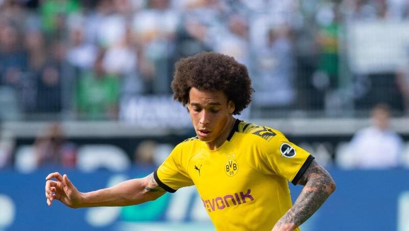 Dortmunds Axel Witsel spietl den Ball. Foto: Guido Kirchner/Archivbild Dortmunds Axel Witsel spietl den Ball. Foto: Guido Kirchner/Archivbild