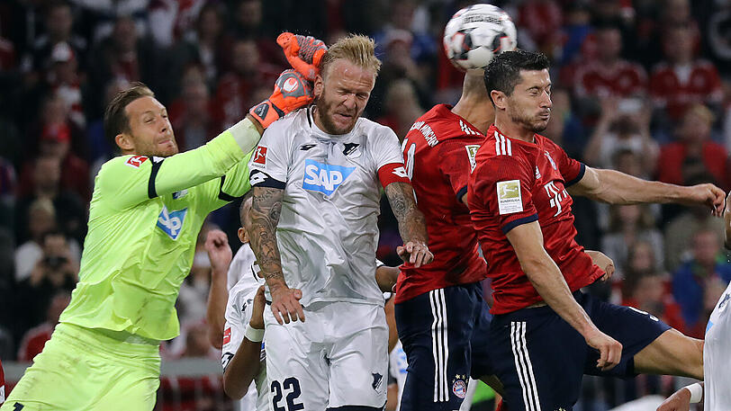 Das Hinspiel und Eröffnungsspiel der laufenden Saison gewann der FC Bayern - hier mit Robert Lewandowski gegen 1899-Keeper Oliver Baumann und Kevin Vogt - in der Allianz Arena mit 3:1.