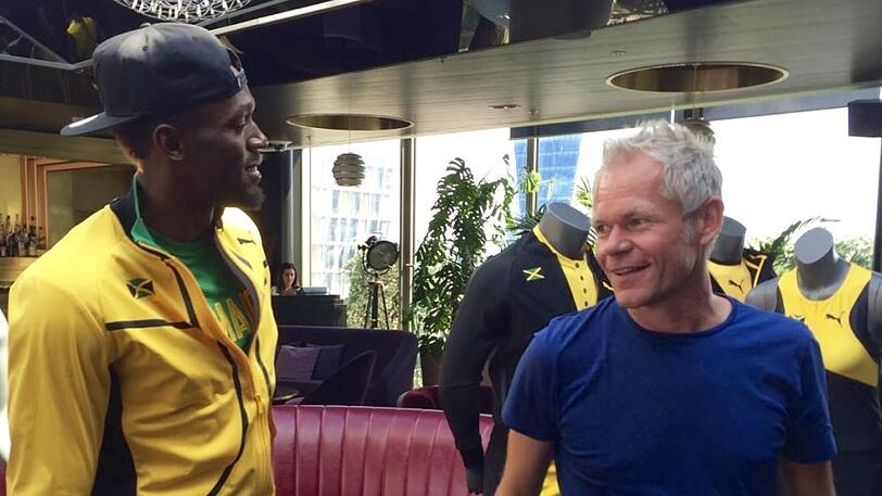 Der Superstar und der Puma-Mann:Bolt und Pascal Rolling (r.).