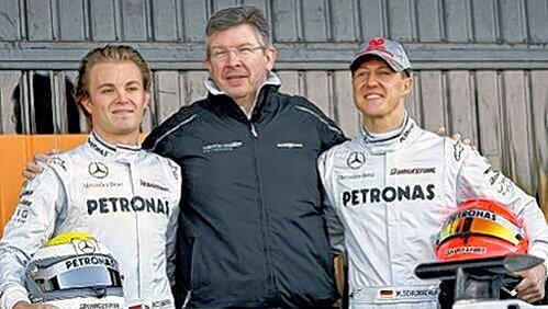 Teamchef Ross Brawn (Mitte) mit den Piloten Michael Schumacher (r.) und Nico Rosberg. Teamchef Ross Brawn (Mitte) mit den Piloten Michael Schumacher (r.) und Nico Rosberg.