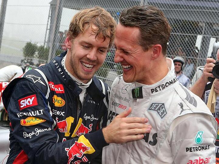 Sebastian Vettel (l) und Michael Schumacher Jahre 2012.