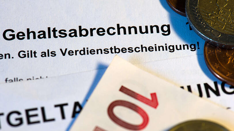 Arbeitnehmer sind aktuell in Sorge: Verdiene ich wegen Corona bald weniger? (Symbolbild)