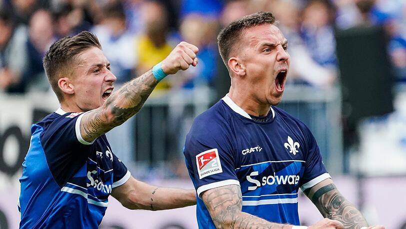 Phillip Tietz (r) schoss Darmstadt gegen Magdeburg in Führung.